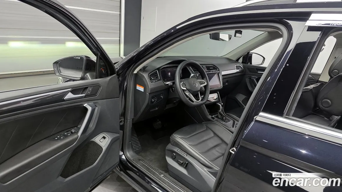 Volkswagen Tiguan — фото 10