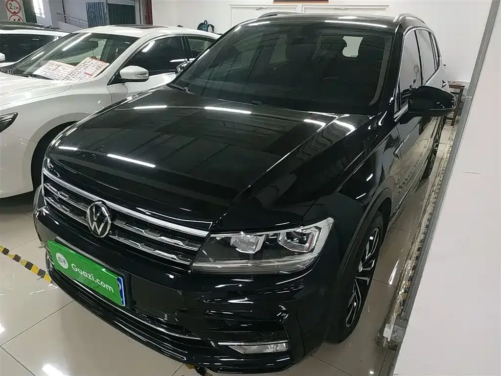Volkswagen Tiguan L — фото 2