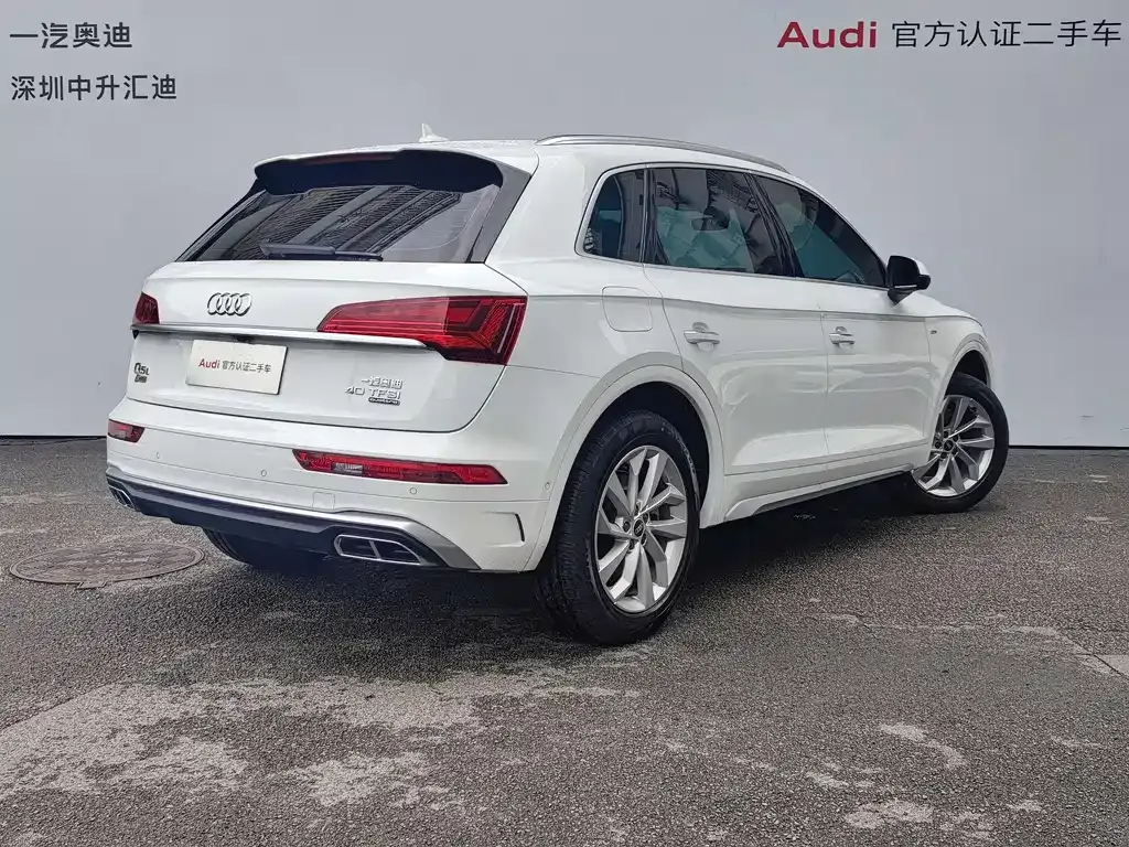Audi Q5L — фото 10