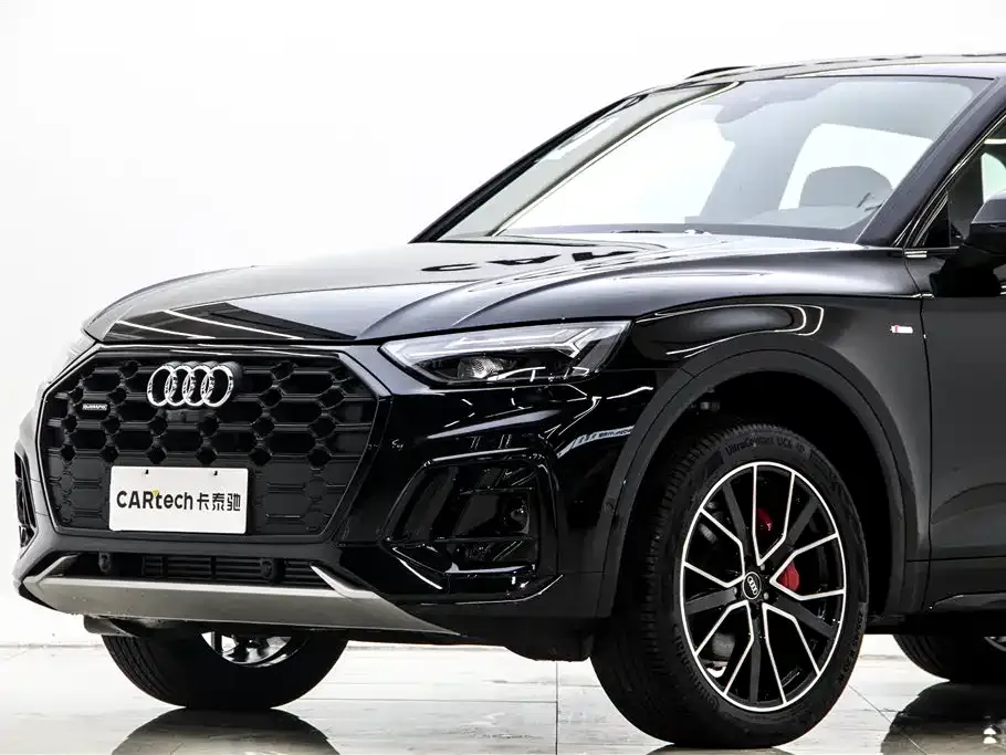 Audi Q5L — фото 7