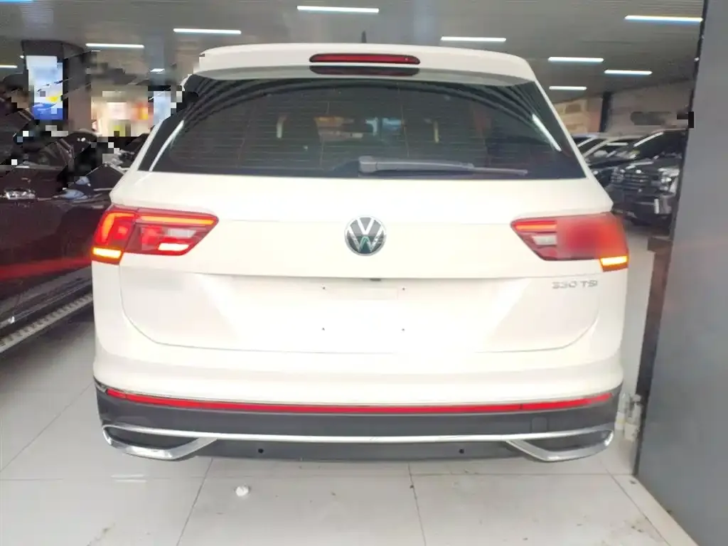 Volkswagen Tiguan L — фото 6