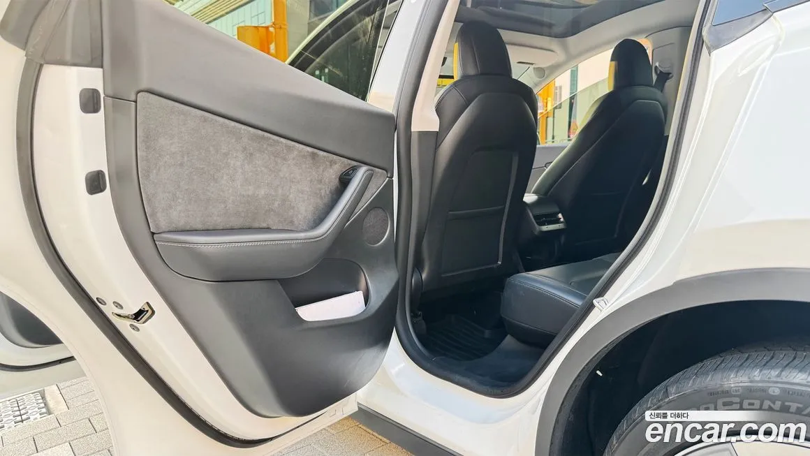 Tesla Model Y — фото 7