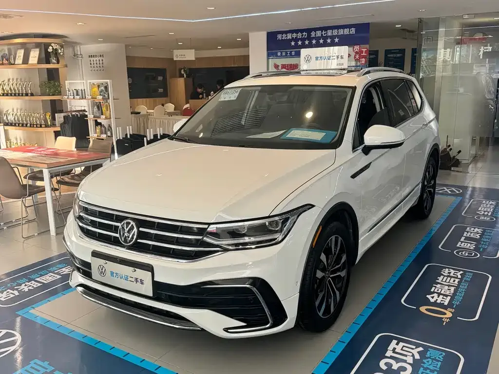 Volkswagen Tiguan L — фото 1