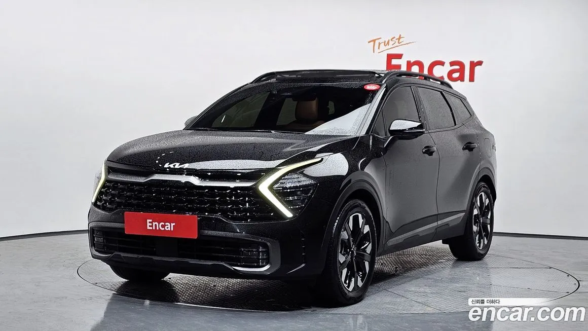 Kia Sportage — фото 1