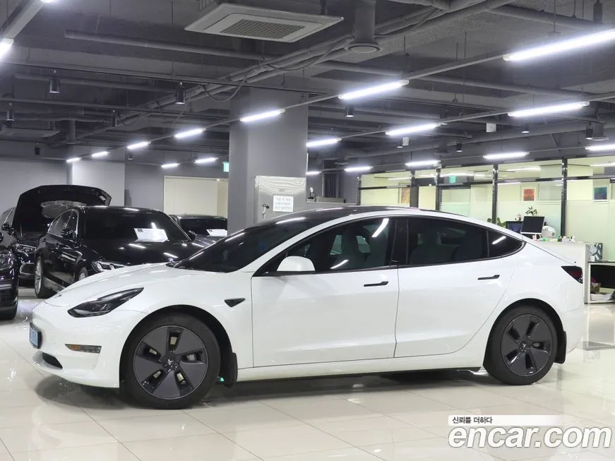 Tesla Model 3 — фото 2