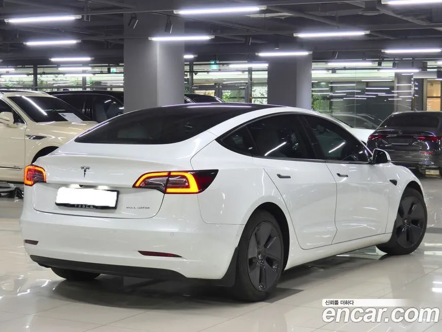 Tesla Model 3 — фото 3