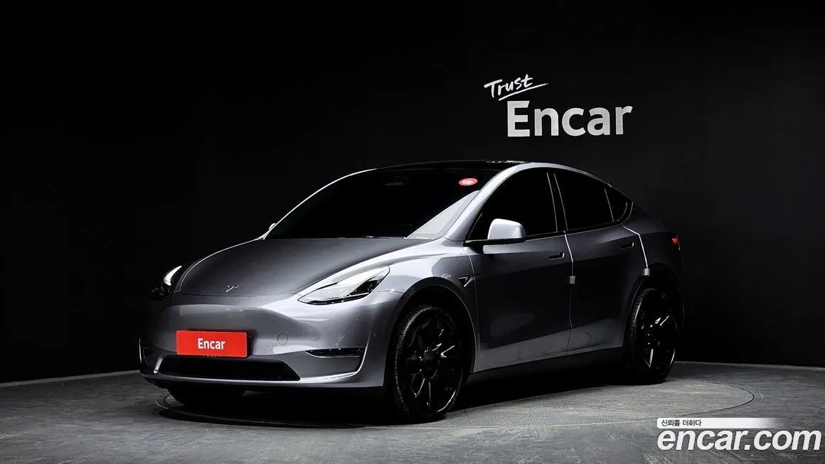 Tesla Model Y — фото 1