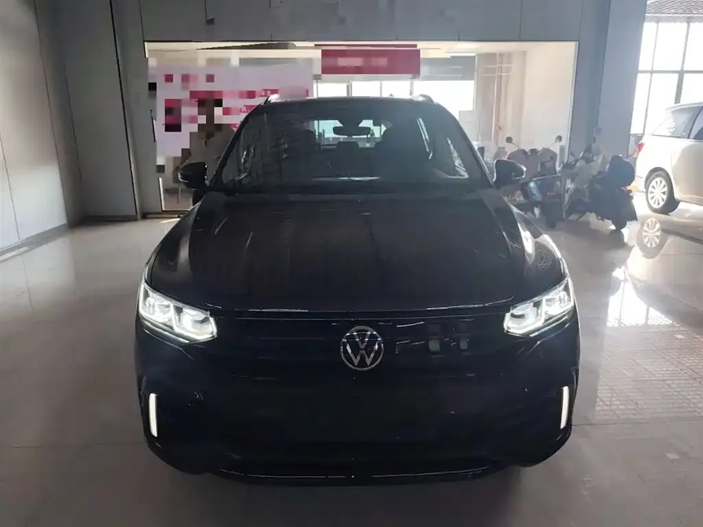 Volkswagen Tiguan L New Energy — фото 3
