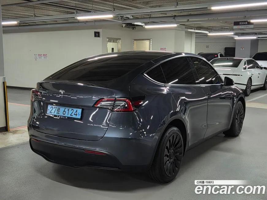 Tesla Model Y — фото 7