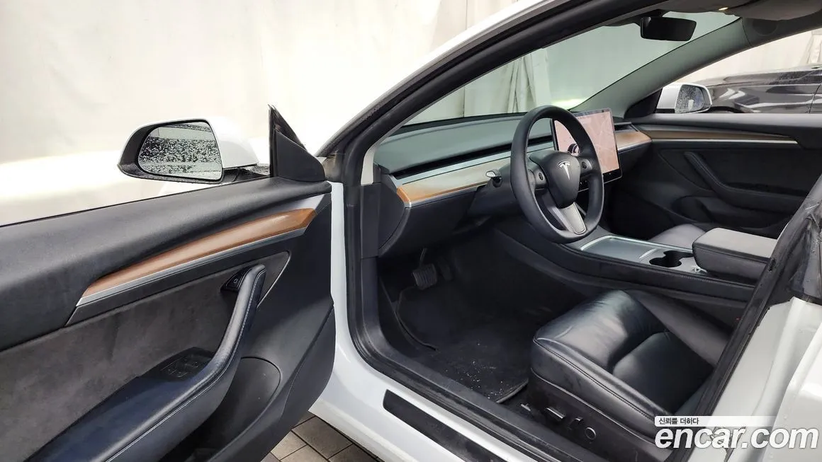 Tesla Model 3 — фото 10