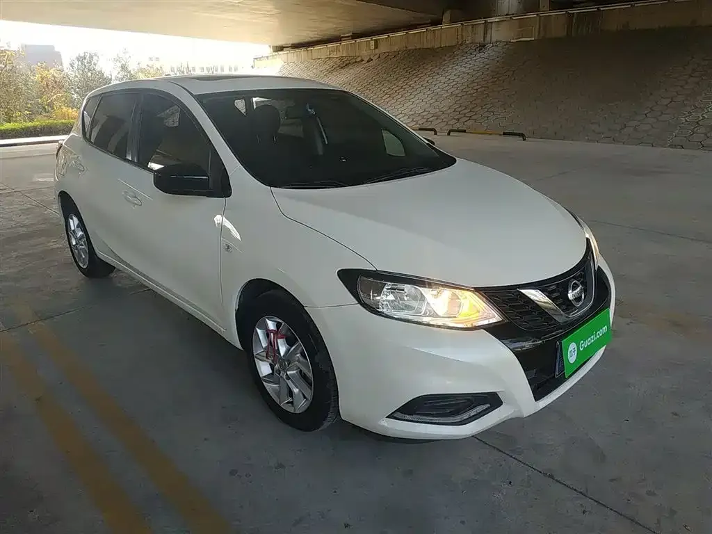 Nissan Tiida — фото 4