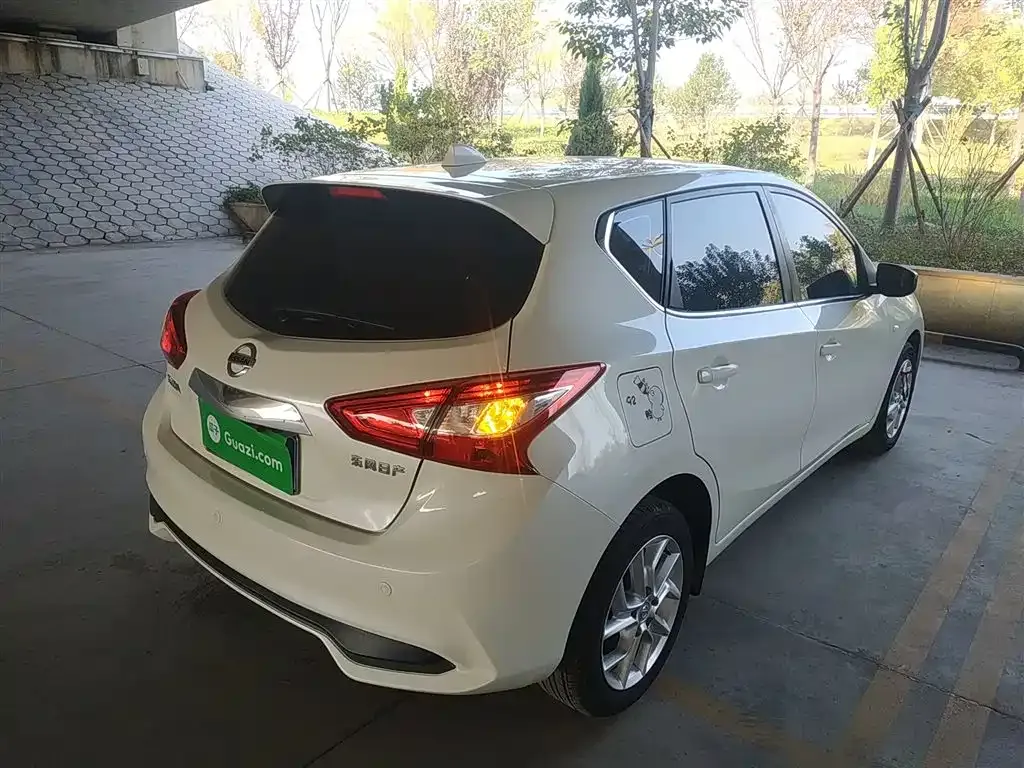 Nissan Tiida — фото 7