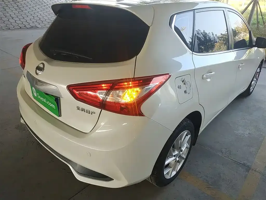 Nissan Tiida — фото 8