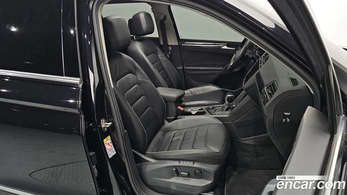 Volkswagen Tiguan — фото 10
