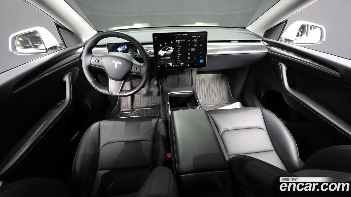 Tesla Model Y — фото 7