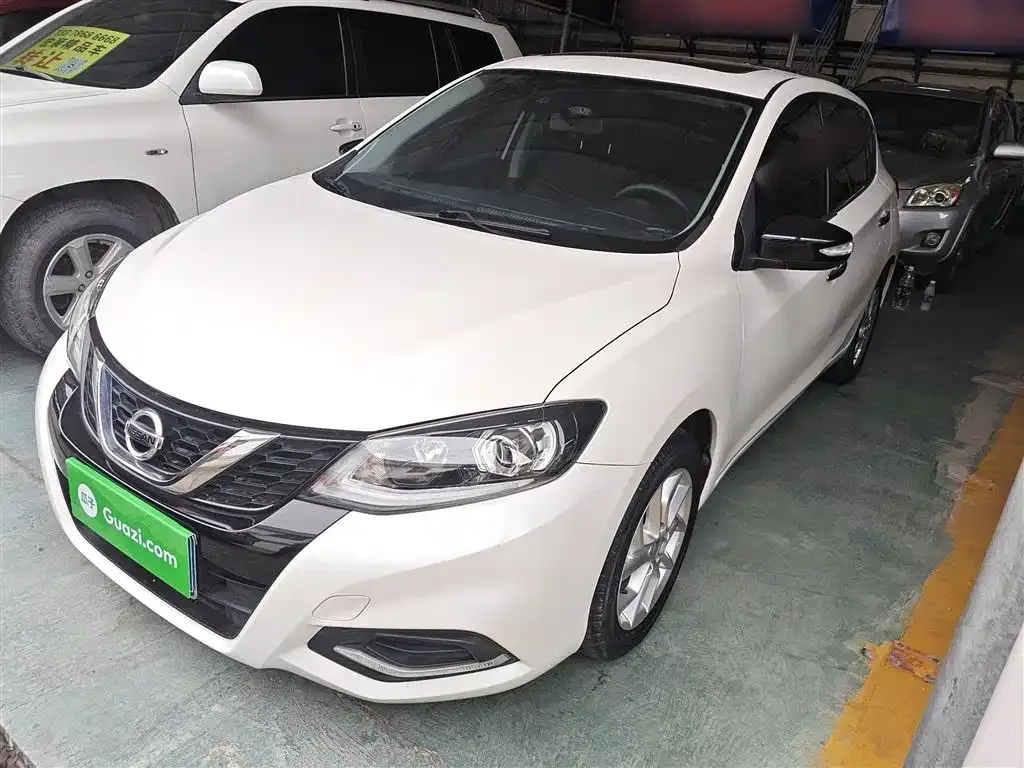 Nissan Tiida — фото 2