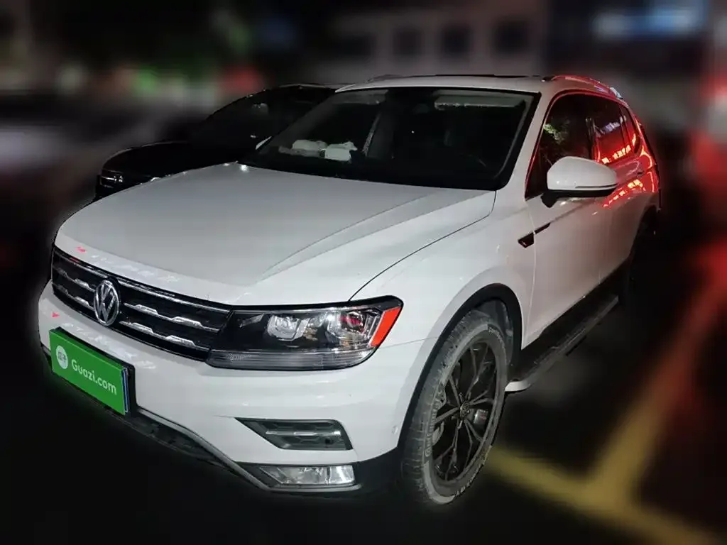 Volkswagen Tiguan L — фото 1