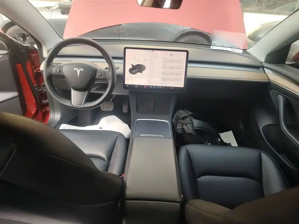 Tesla Model 3 — фото 10
