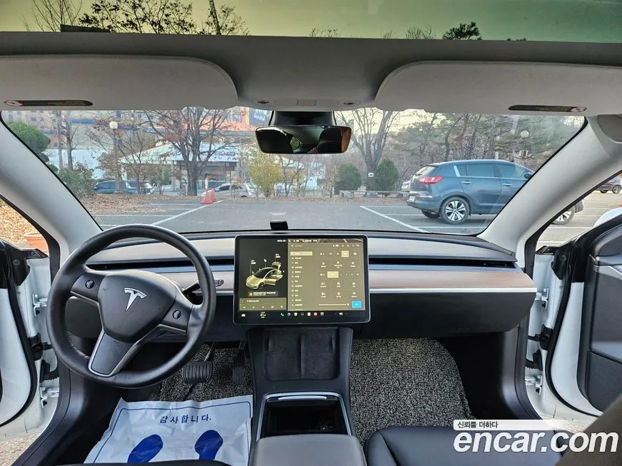 Tesla Model 3 — фото 10