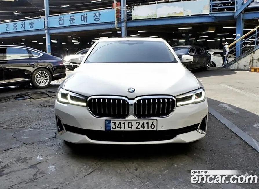BMW 5-Series — фото 1