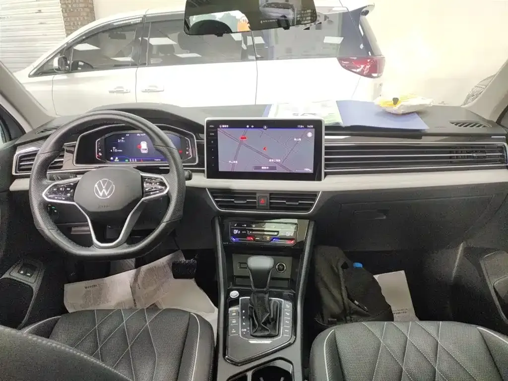 Volkswagen Tiguan L New Energy — фото 10