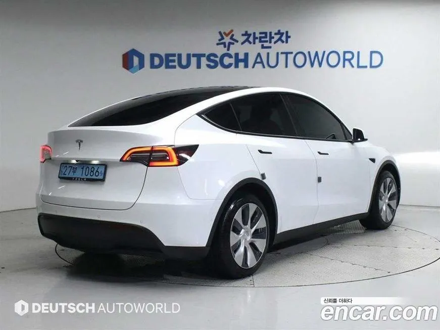 Tesla Model Y — фото 2