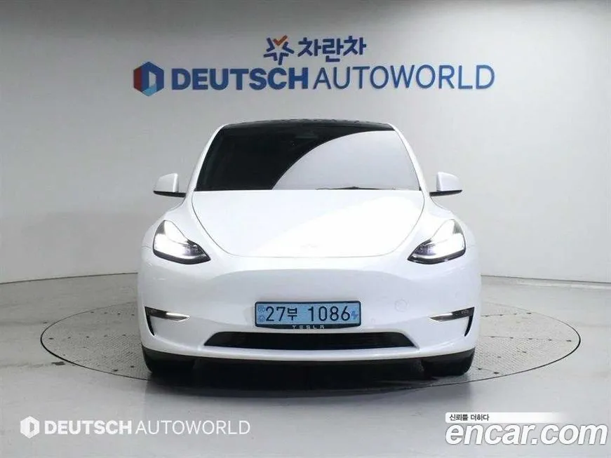Tesla Model Y — фото 3
