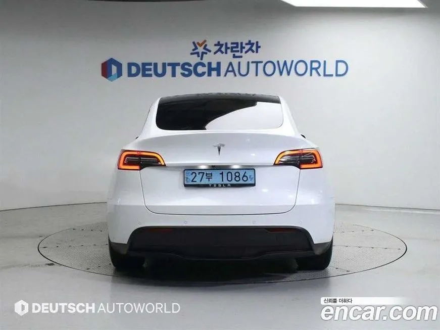Tesla Model Y — фото 4