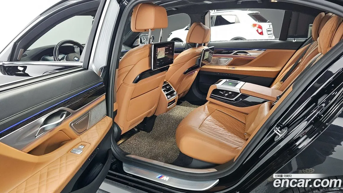 BMW 7-Series — фото 10
