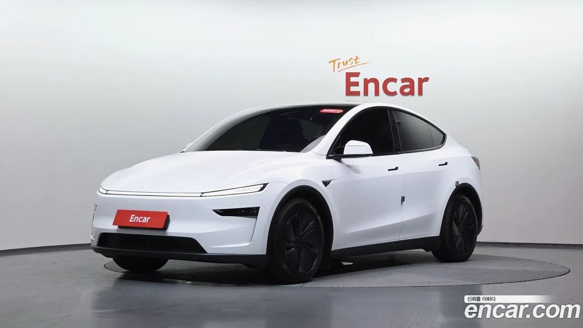 Tesla Model Y — фото 1