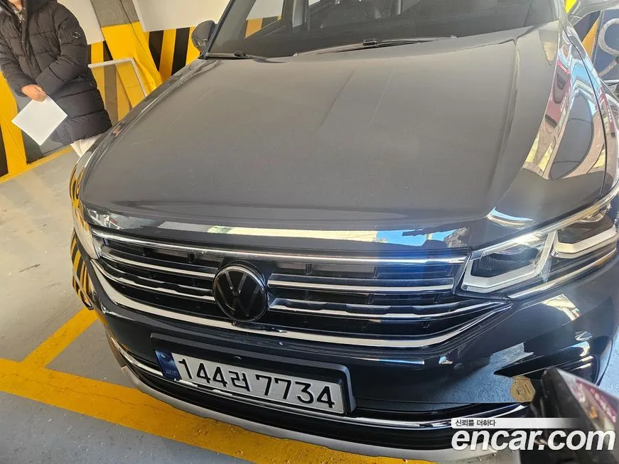 Volkswagen Tiguan — фото 1