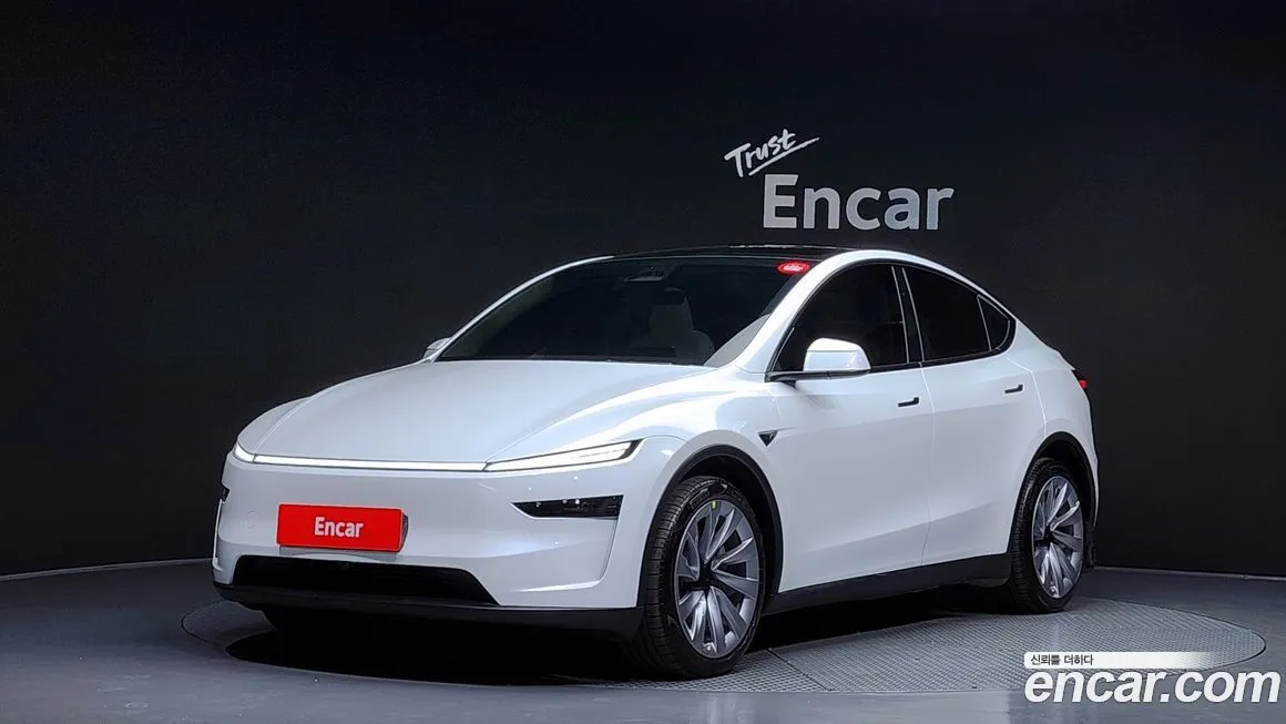 Tesla Model Y — фото 1