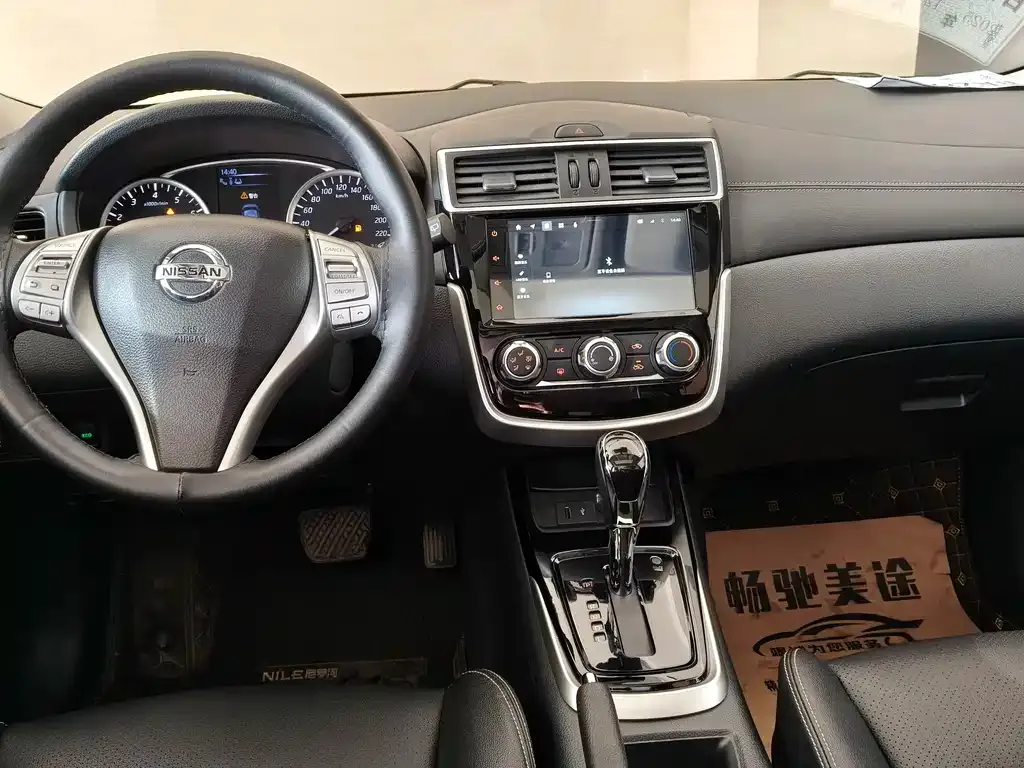 Nissan Tiida — фото 9