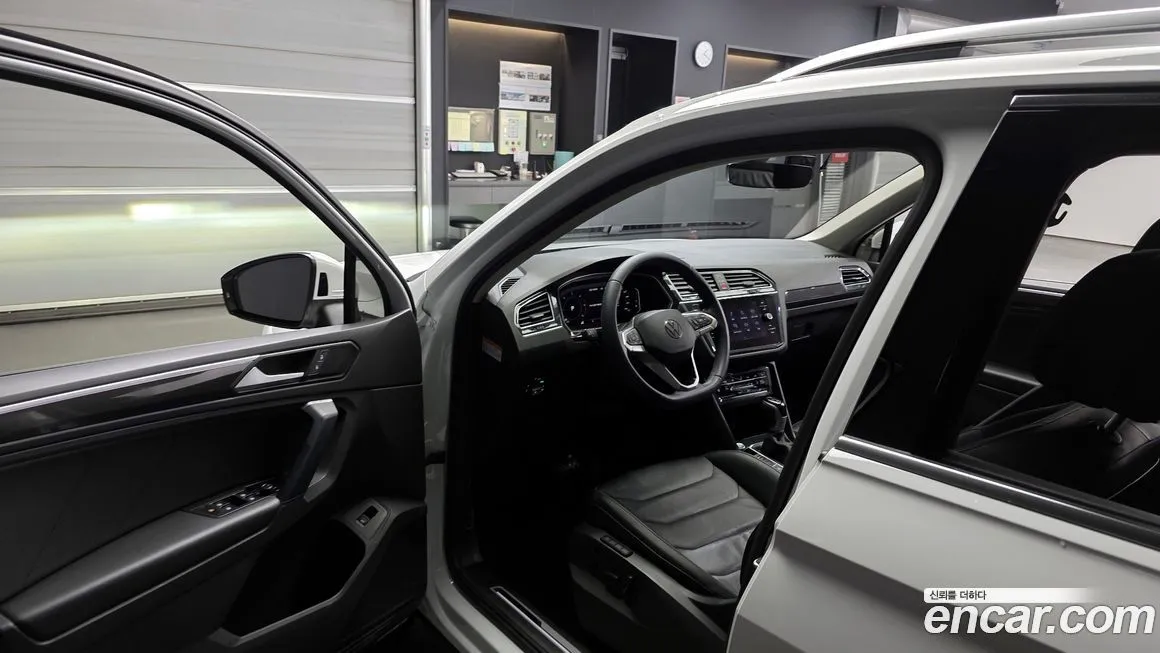 Volkswagen Tiguan — фото 10