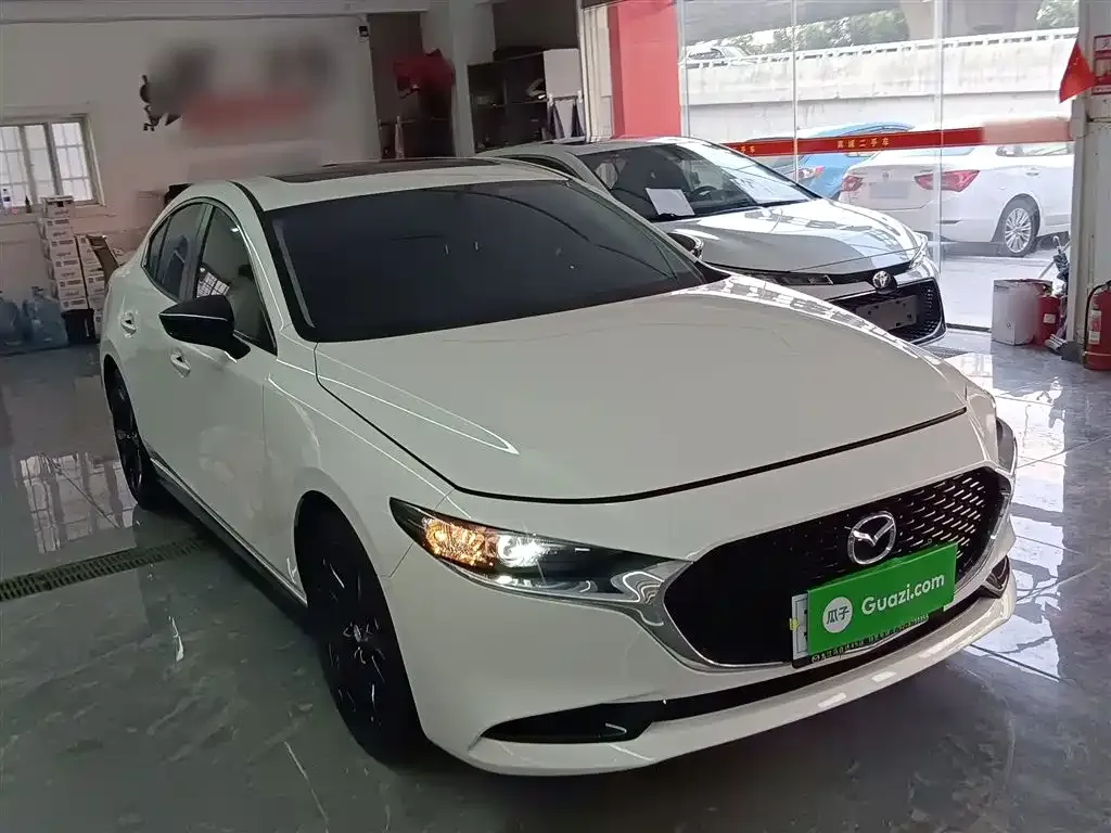Mazda 3 Axela — фото 4