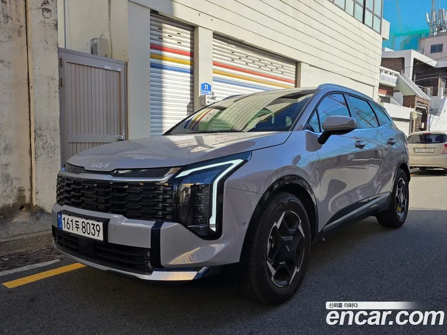 Kia Sportage — фото 1