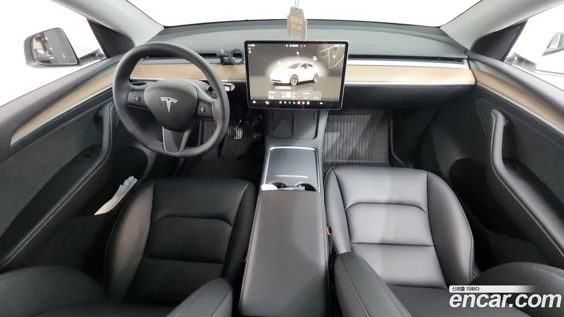 Tesla Model Y — фото 7