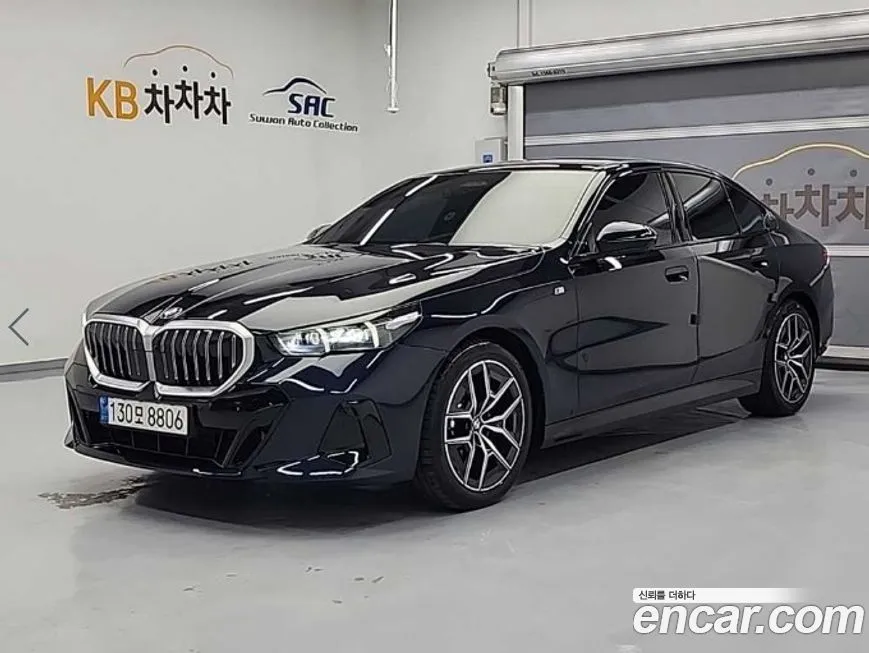 BMW 5-Series — фото 1