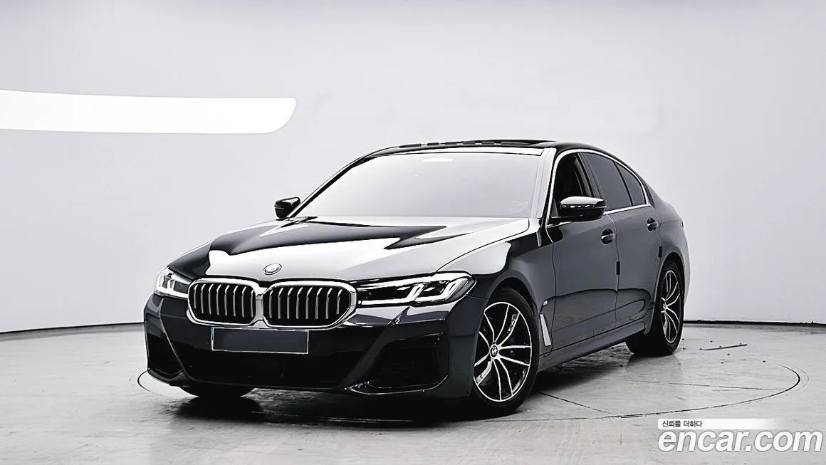 BMW 5-Series — фото 1