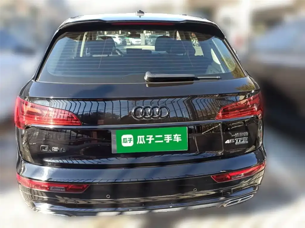 Audi Q5L — фото 10