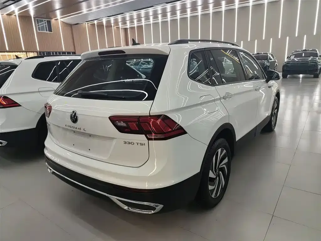 Volkswagen Tiguan L — фото 7