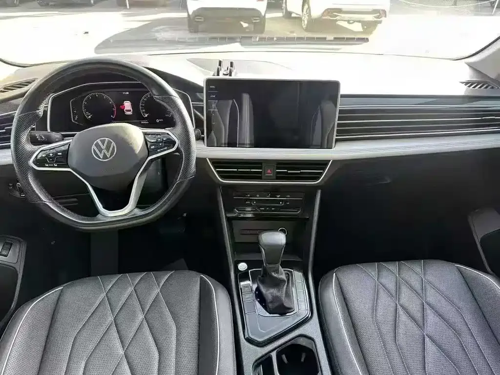 Volkswagen Tiguan L — фото 5