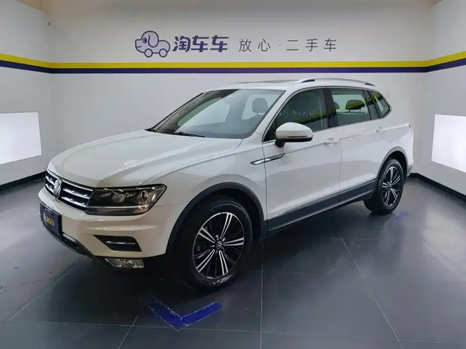 Volkswagen Tiguan L — фото 1