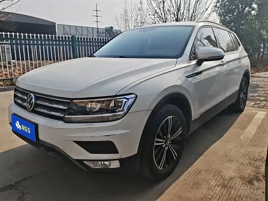 Volkswagen Tiguan L — фото 1