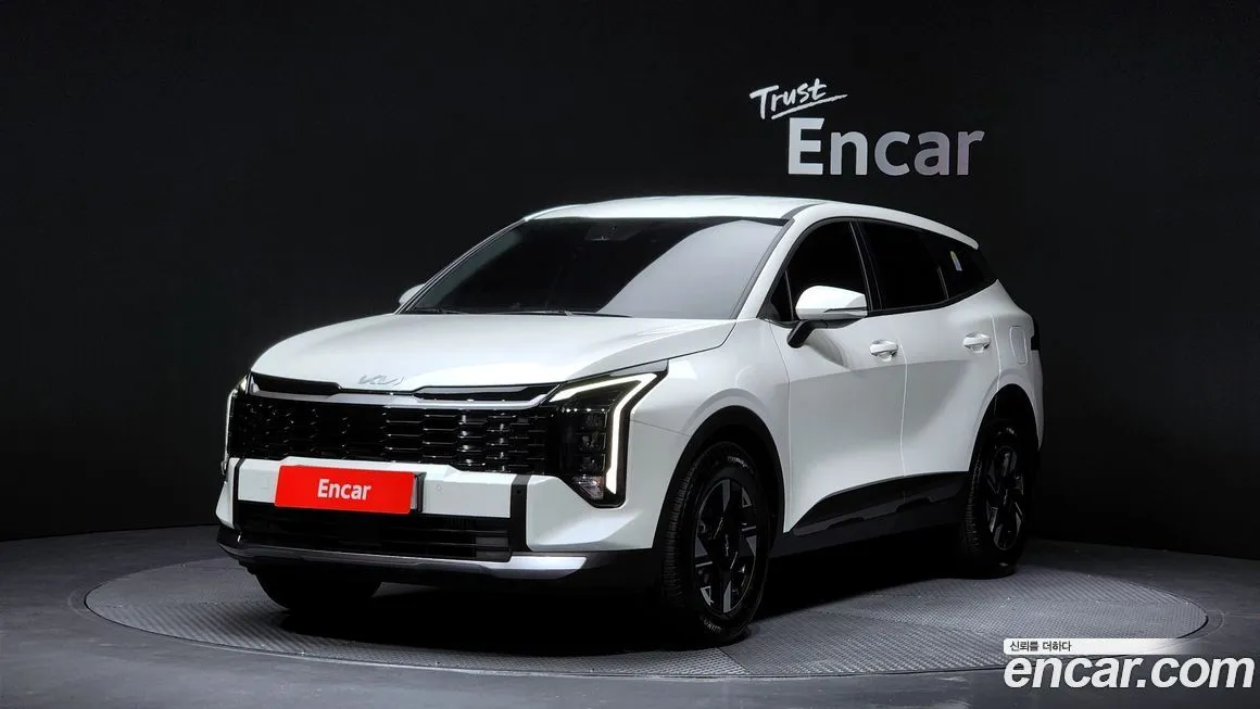 Kia Sportage — фото 1