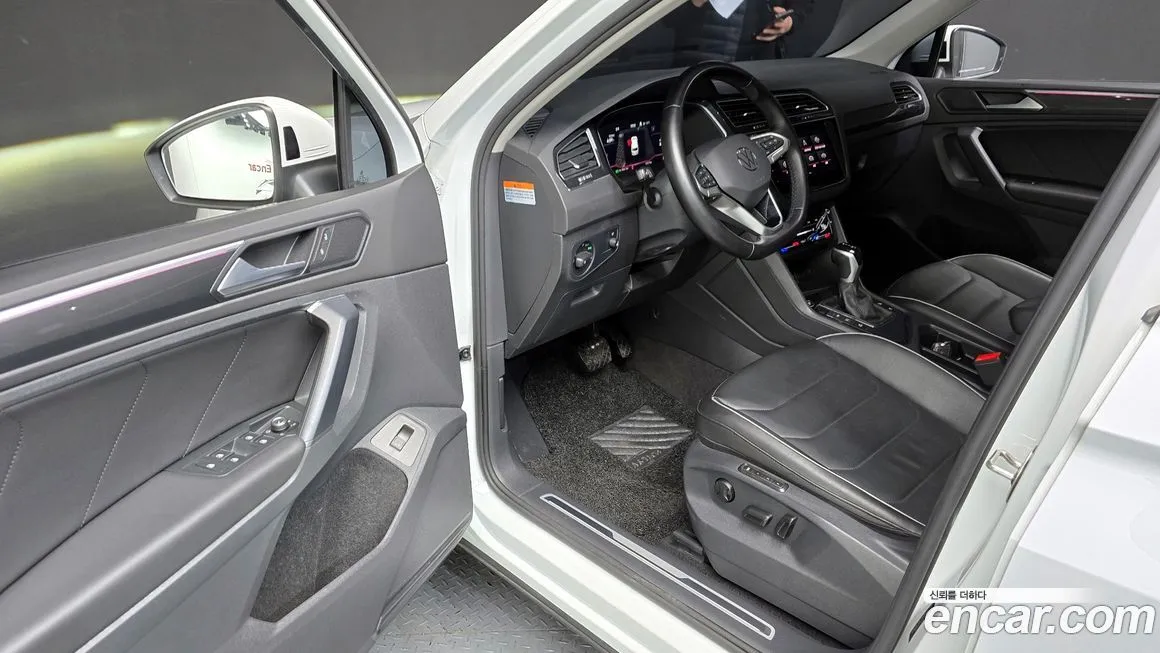 Volkswagen Tiguan — фото 10