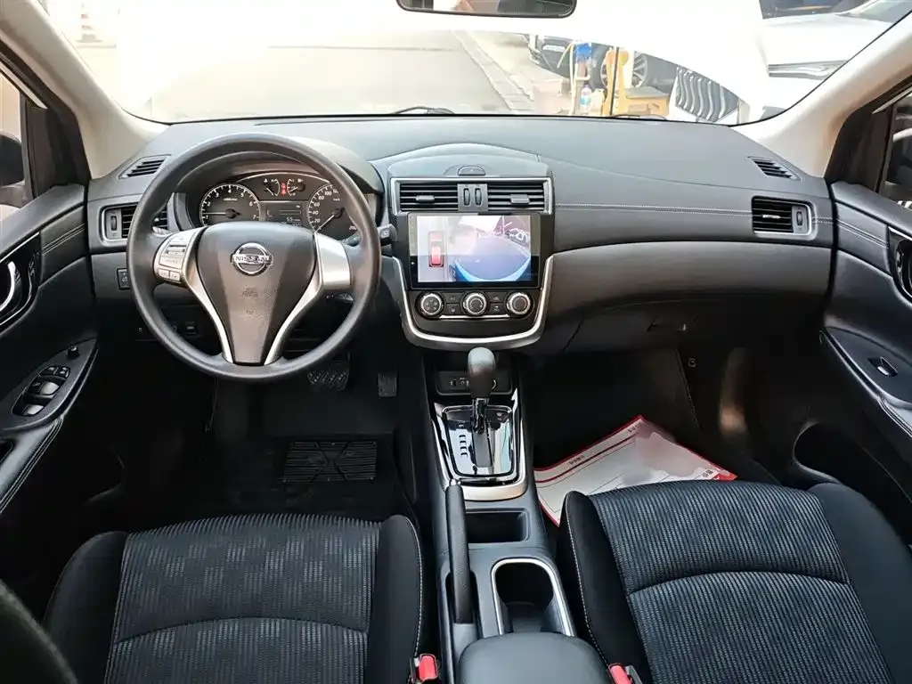 Nissan Tiida — фото 9