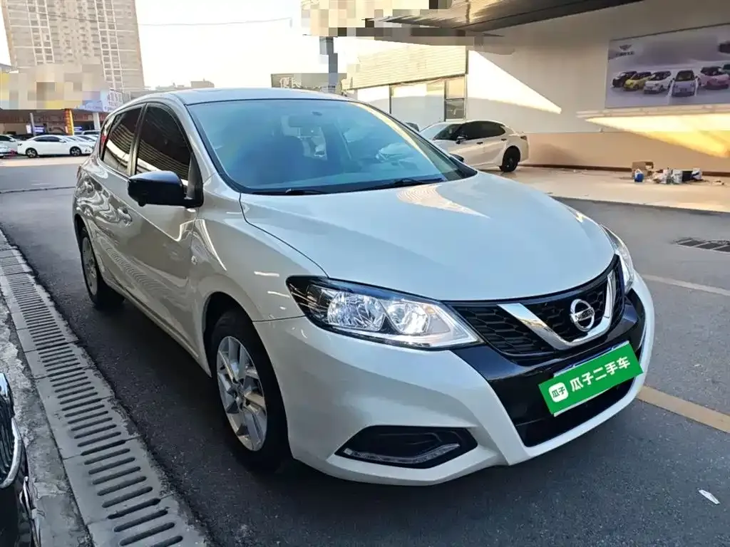 Nissan Tiida — фото 8