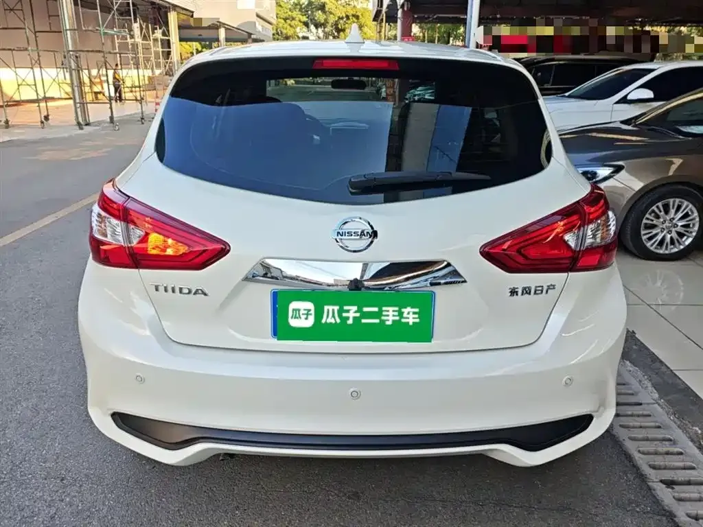 Nissan Tiida — фото 4