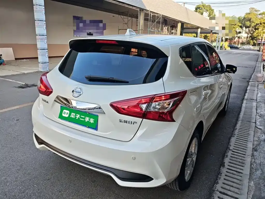 Nissan Tiida — фото 10